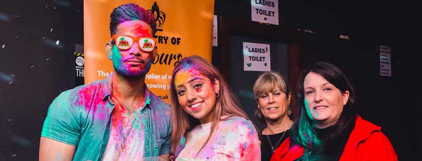 leeds students covered in colour powder