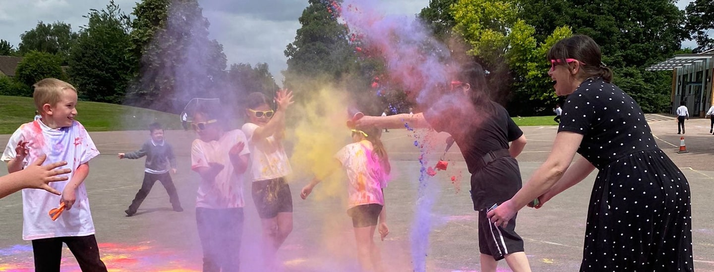 kids playing with colour powder