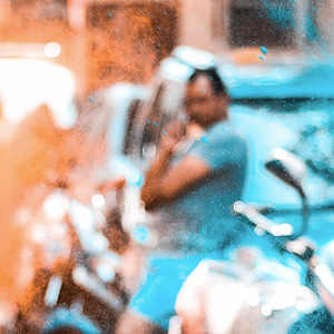 2 Men having a Colour powder fight on the street