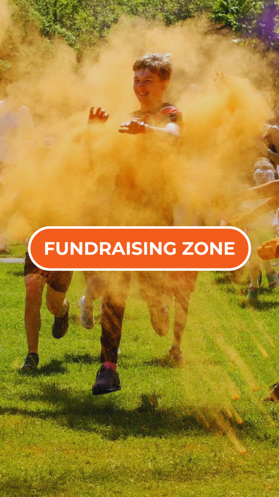 People running through a cloud of yellow colour powder with 'FUNDRAISING ZONE' text overlay.
