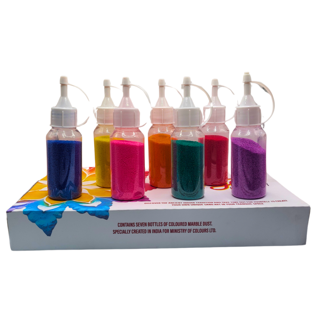 A set of six bottles with different colors of marble dust for Rangoli art, displayed on the box with a floral design.
