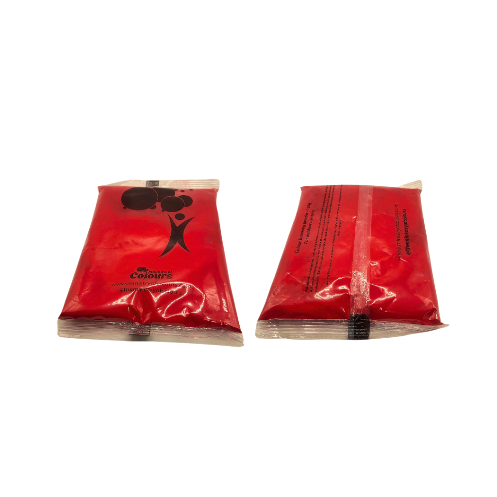 A bag of red colour powder from Ministry Of Colours on white background.