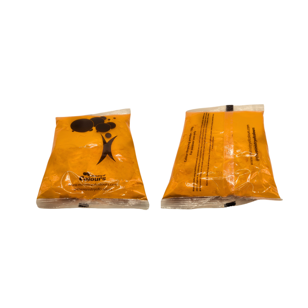 A bag of orange colour powder from Ministry Of Colours on white background.