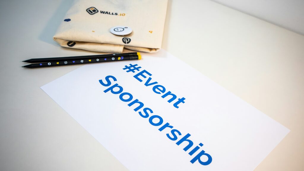 Event sponsorship sign representing local business support for a school colour run